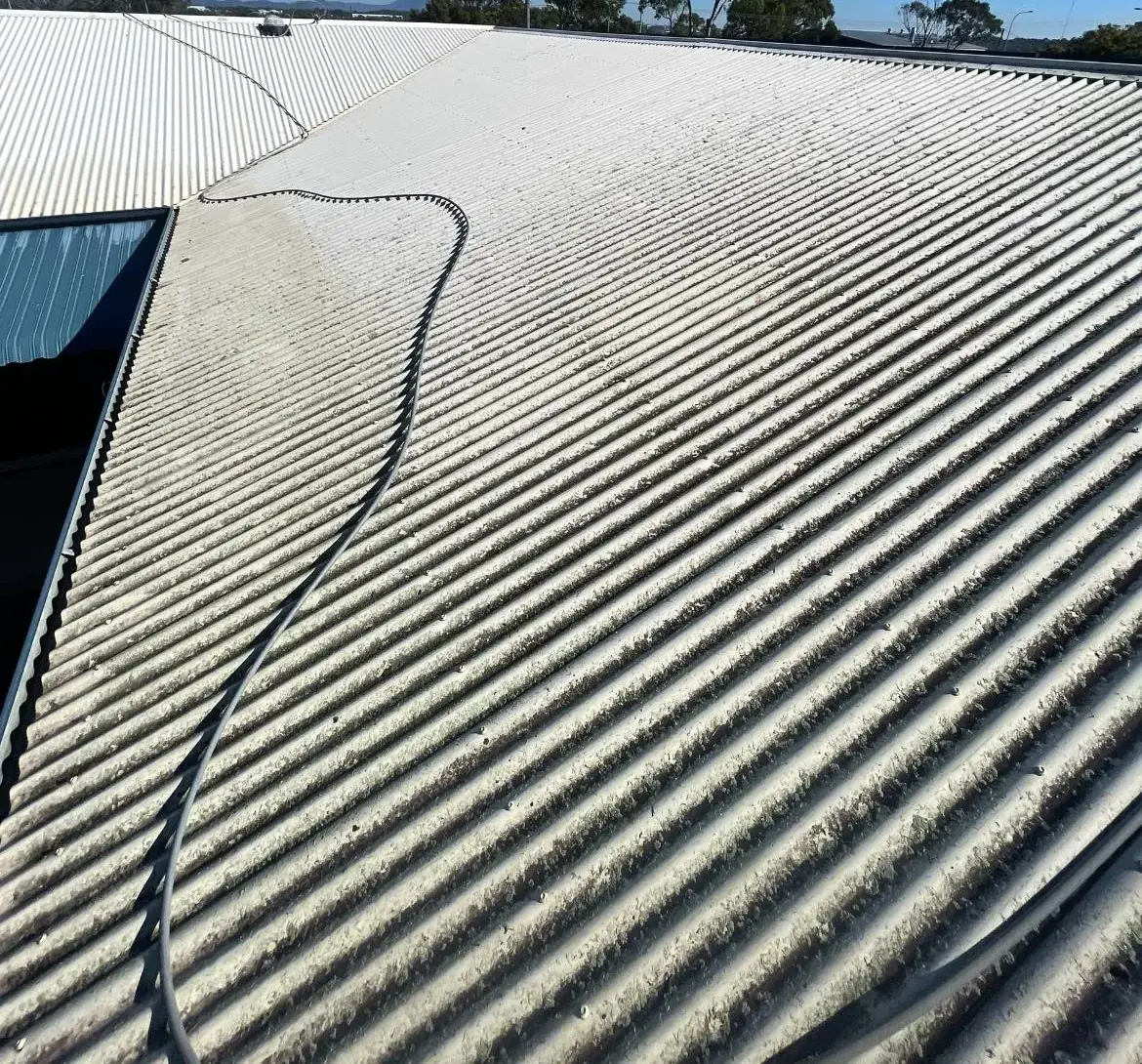 Gladstone roof before soft washing by Call Campo