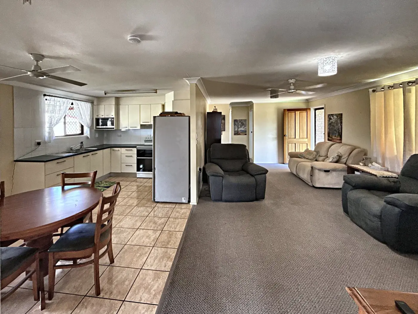 Tiled kitchen and dining area