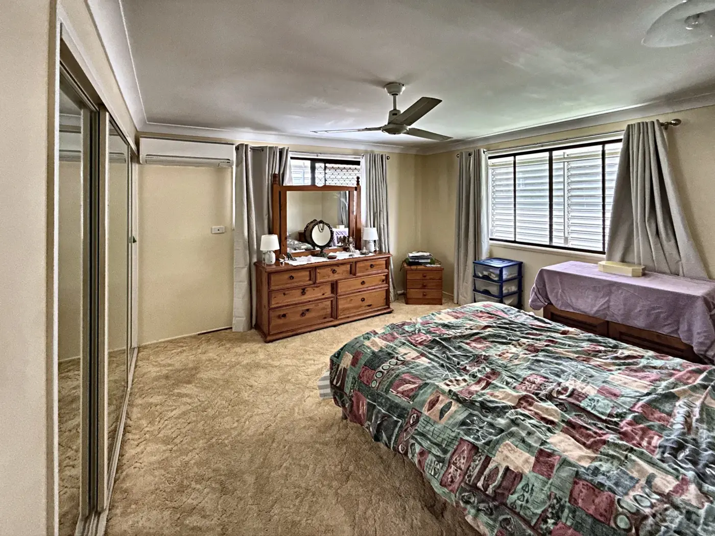 Main bedroom with mirrored built-in robe